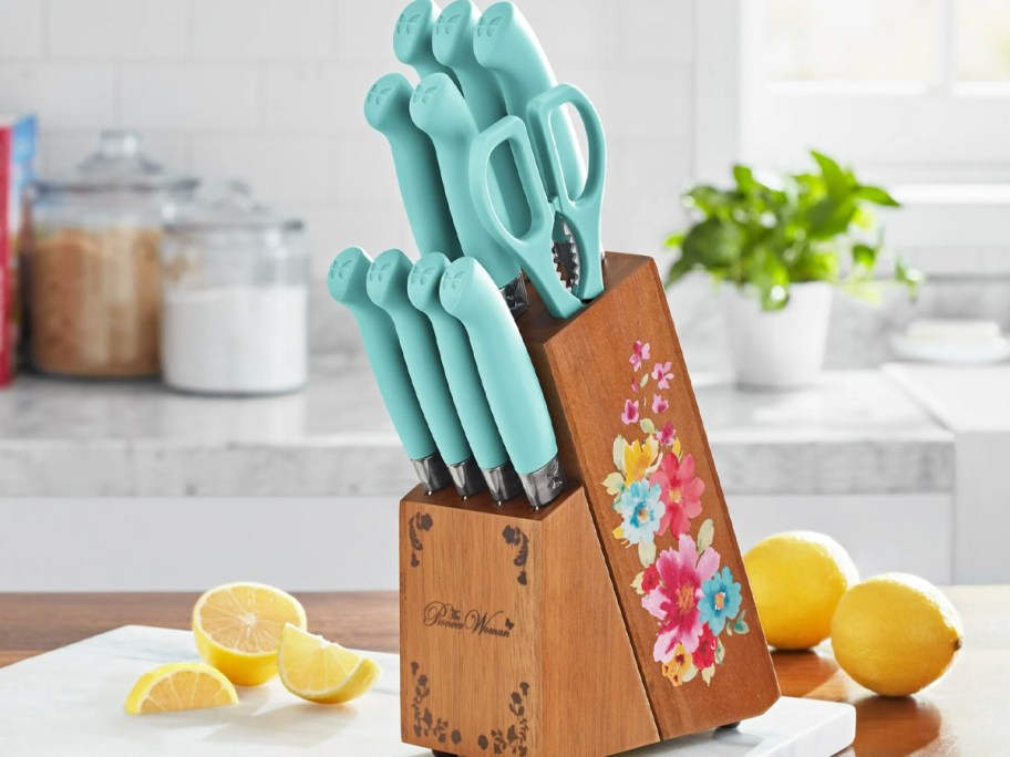 floral teal knife set with block on table