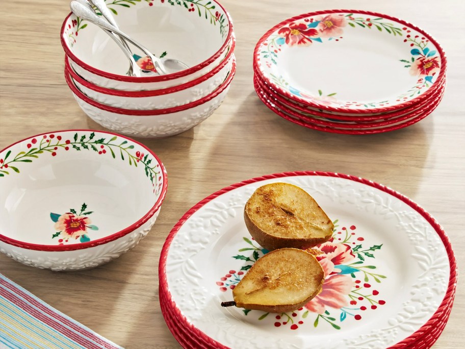 red floral pioneer woman plates on table