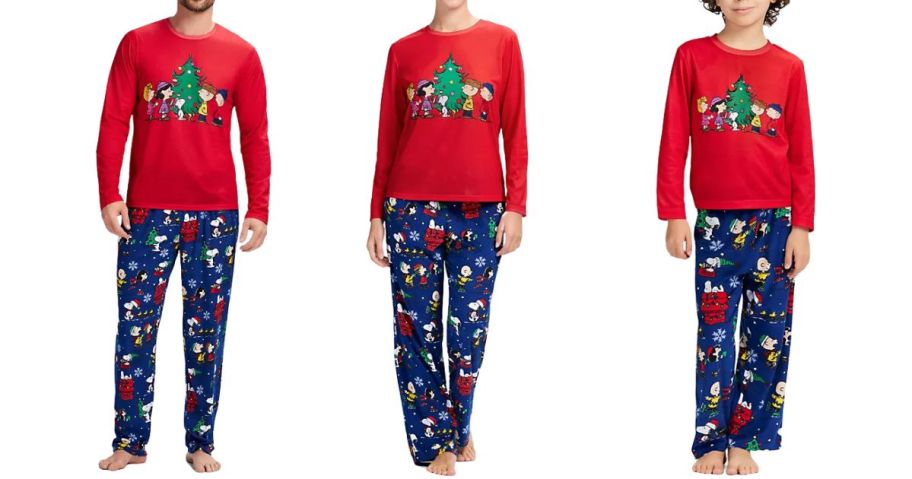 man woman and child in peanuts holiday matching pajamas