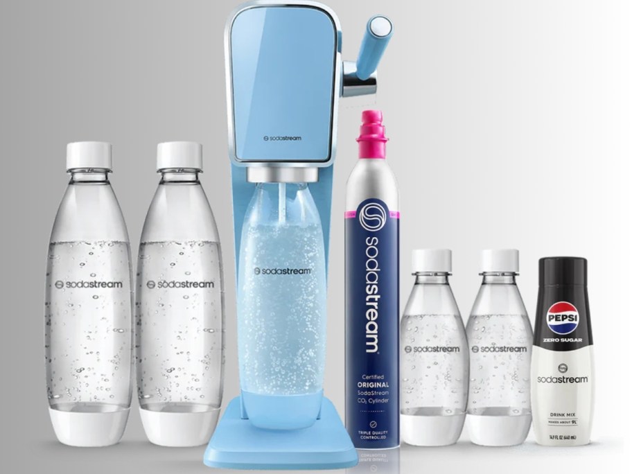 a blue SodaStream Art machine with a bottle with carbonated drink, large and small bottles and a CO2 cylinder around it