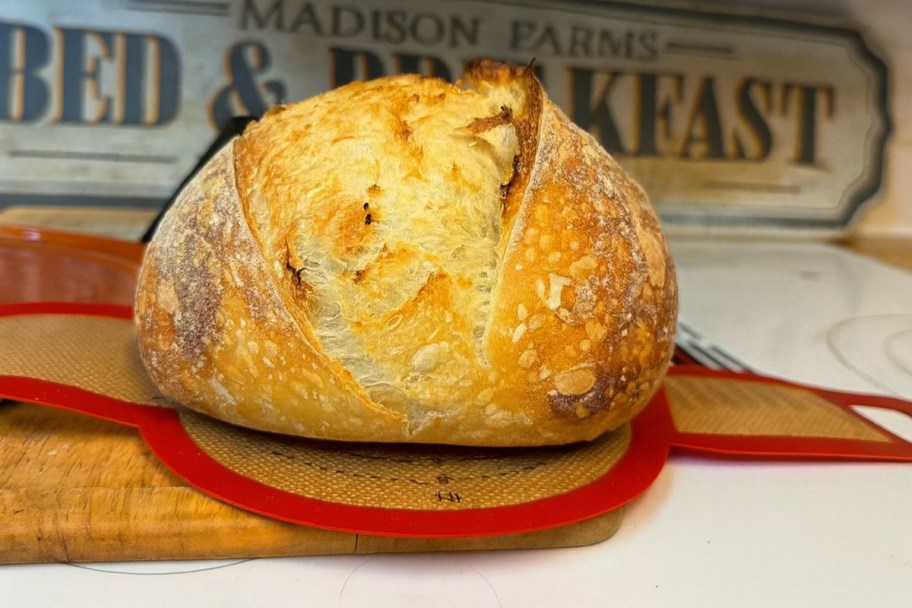 loaf of sourdough bread on a sling
