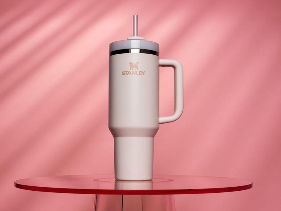 rose quartz Stanley tumbler with pink backdrop