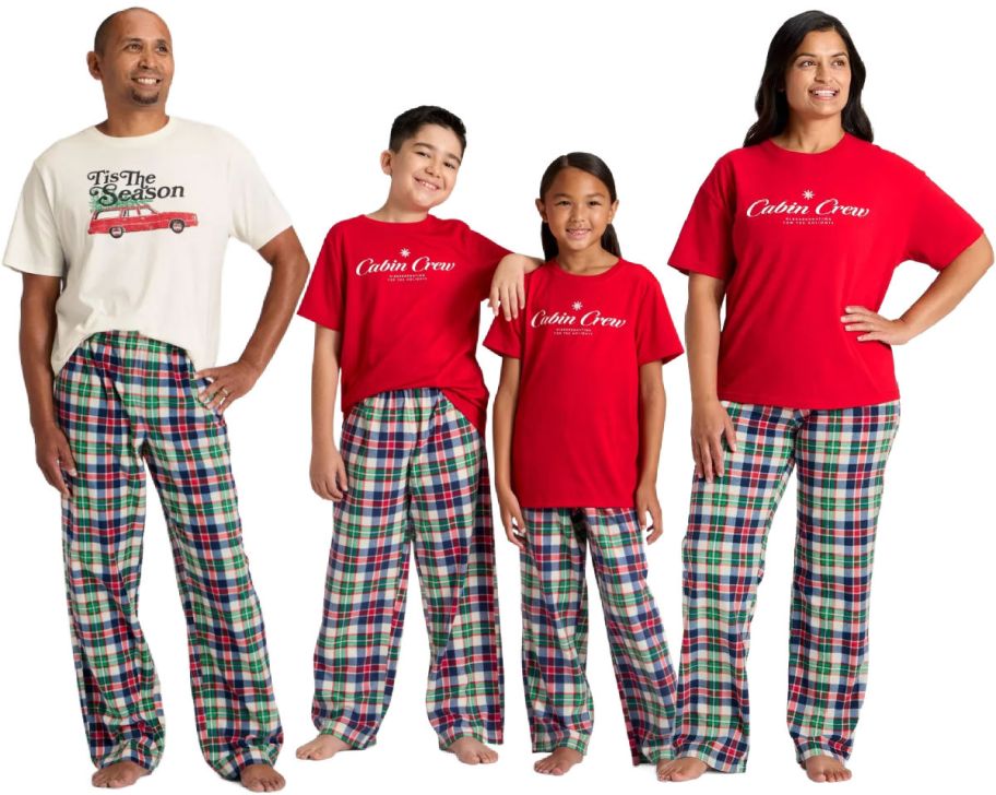 4 people wearing holiday pajamas on a white background