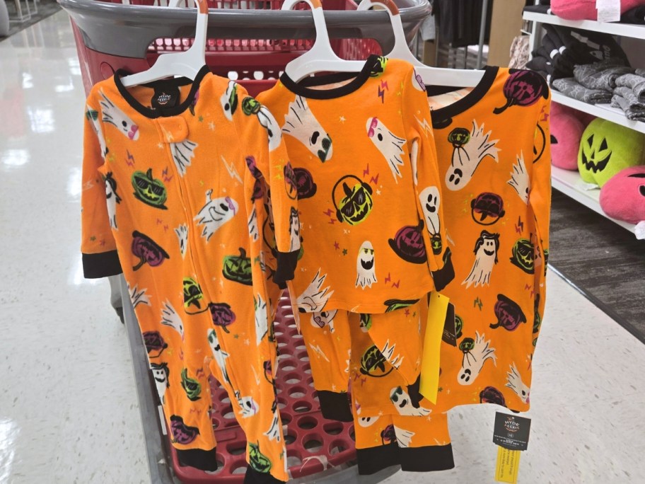 a Target cart with kids and adults matching Halloween pajamas