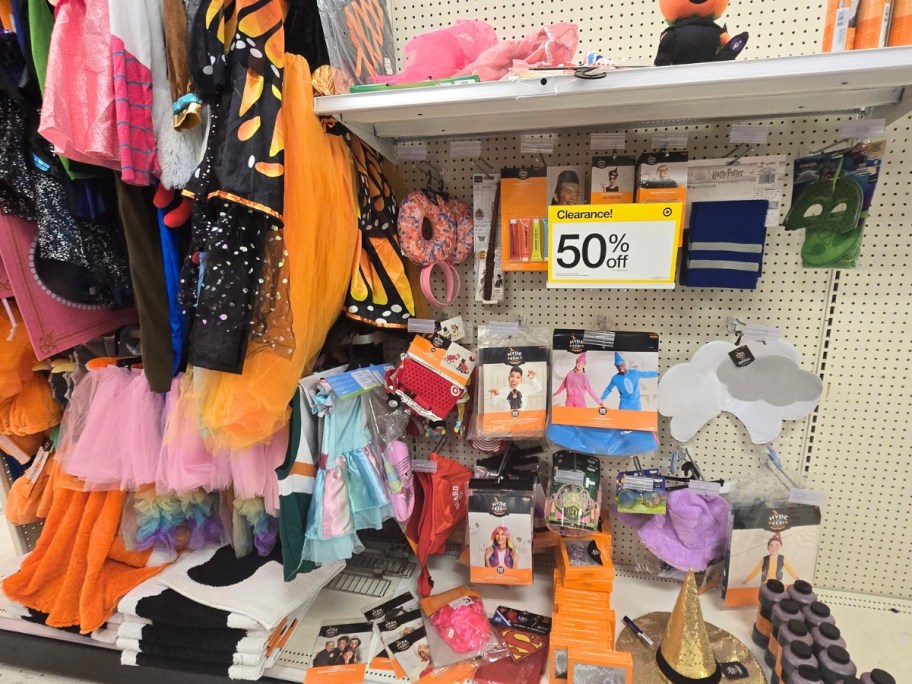 Target store aisle showing Halloween costumes and accessories