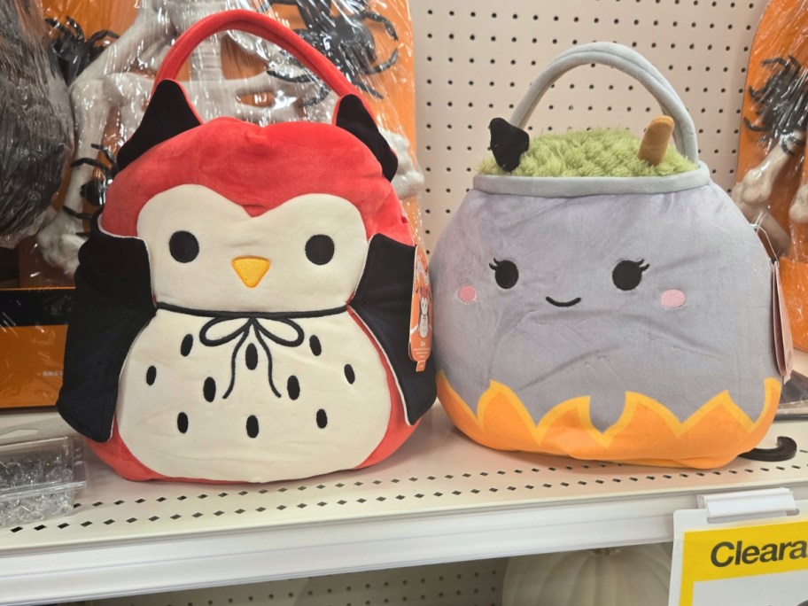 Squishamllow Halloween pails on a Target shelf