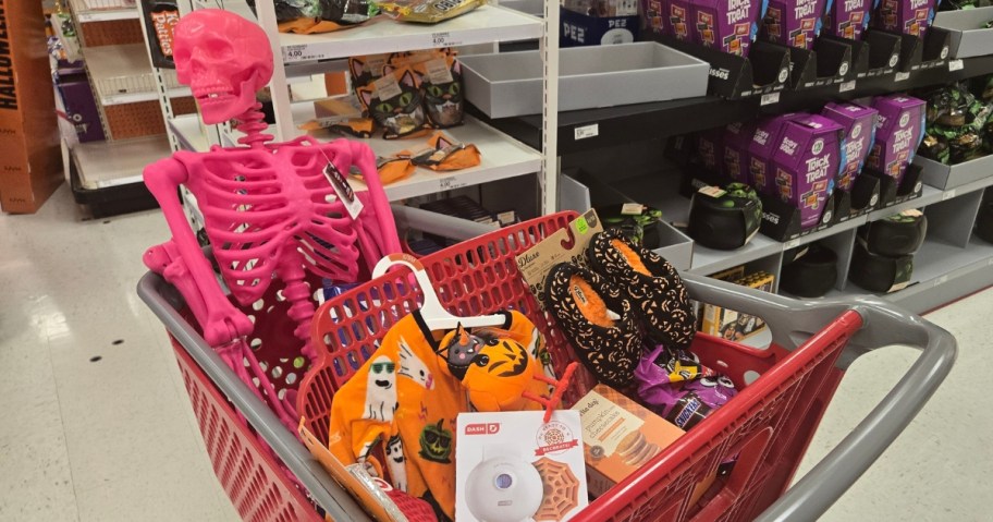 Target cart filled with Halloween decorations and items