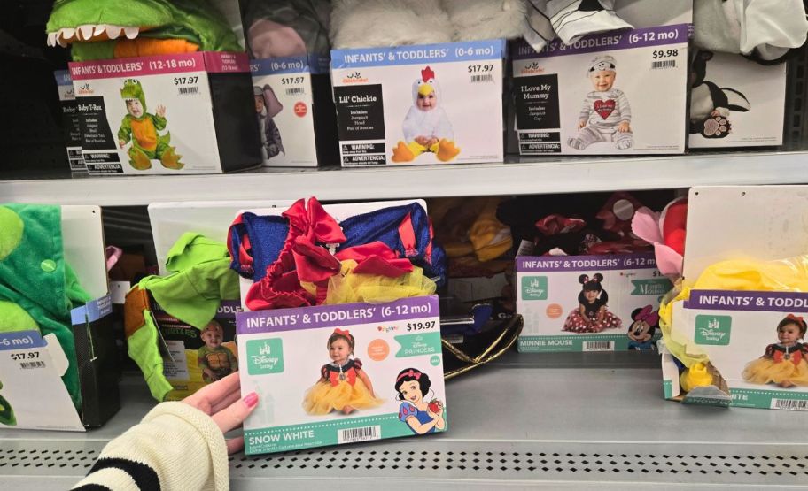 toddler halloween costumes on a store shelf