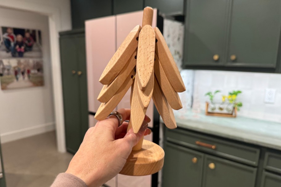 hand holding trivet tree