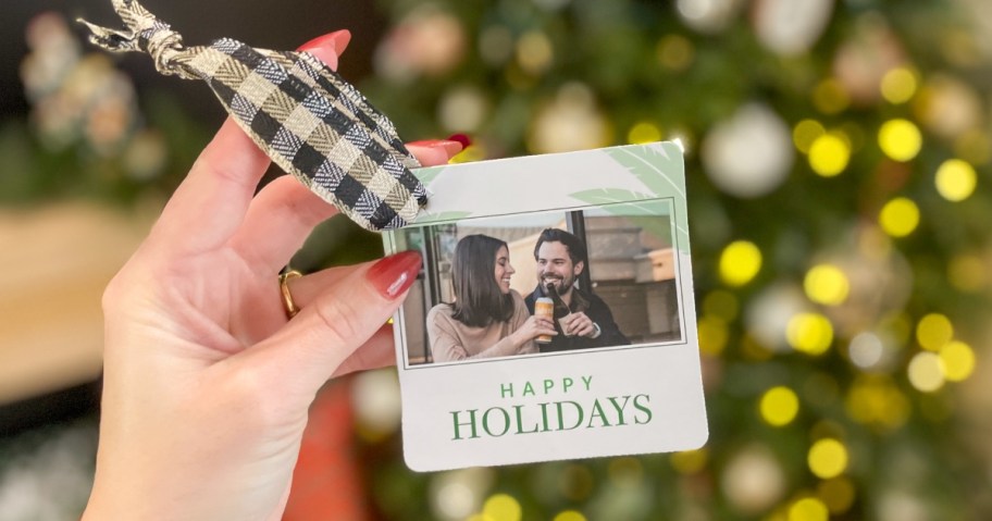 photo coaster with ribbon in hand