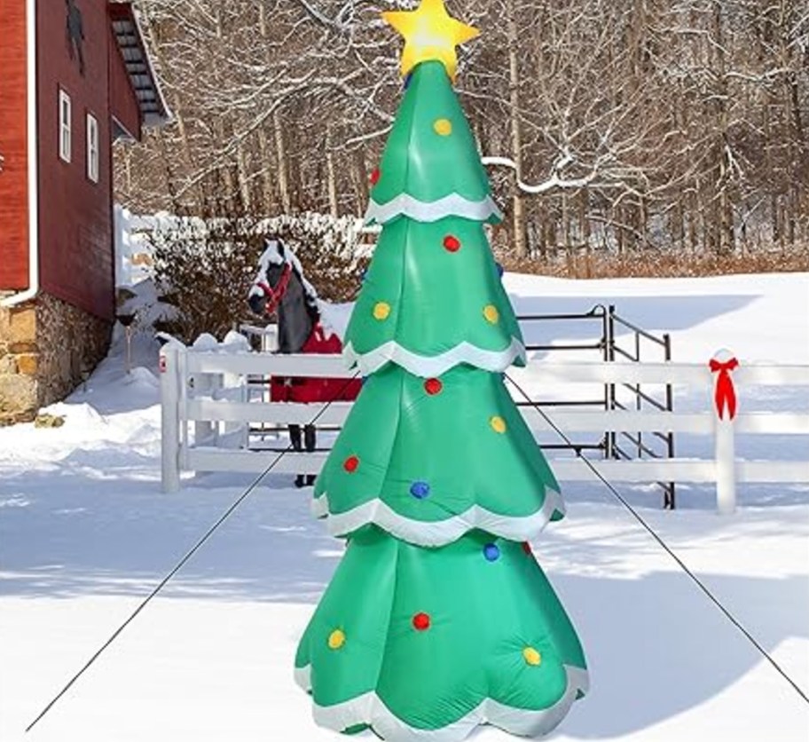 inflatable tree decor in snow