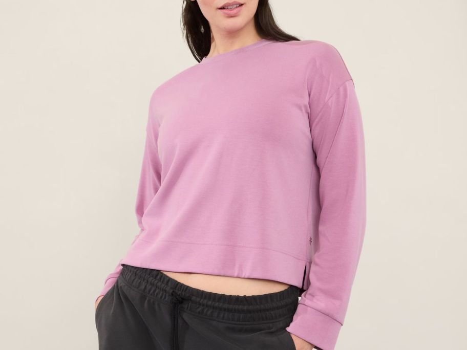 woman wearing an Athleta Seasoft Crewneck Sweatshirt