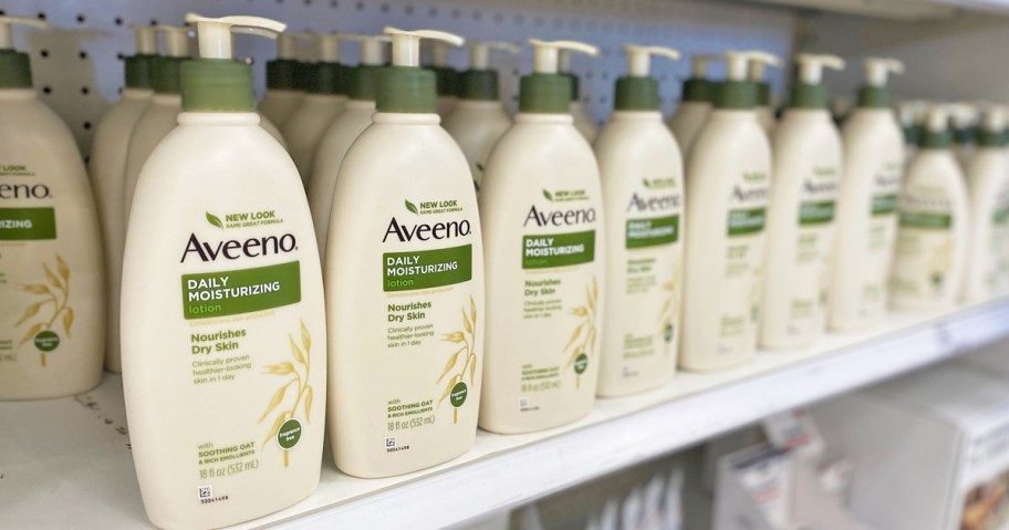 aveeno lotions in a row on store shelf