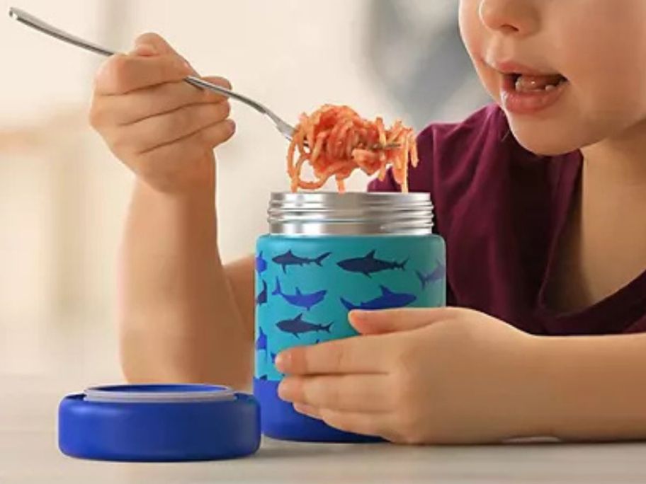 Girl eating from Bentgo Steel Food Jar