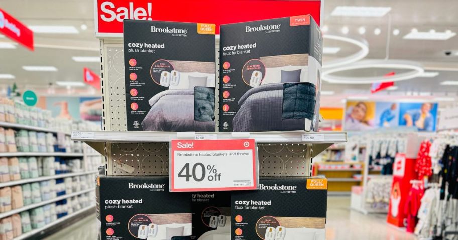 An endcap at Target with Brookstone Throws and a 40% off sale sign