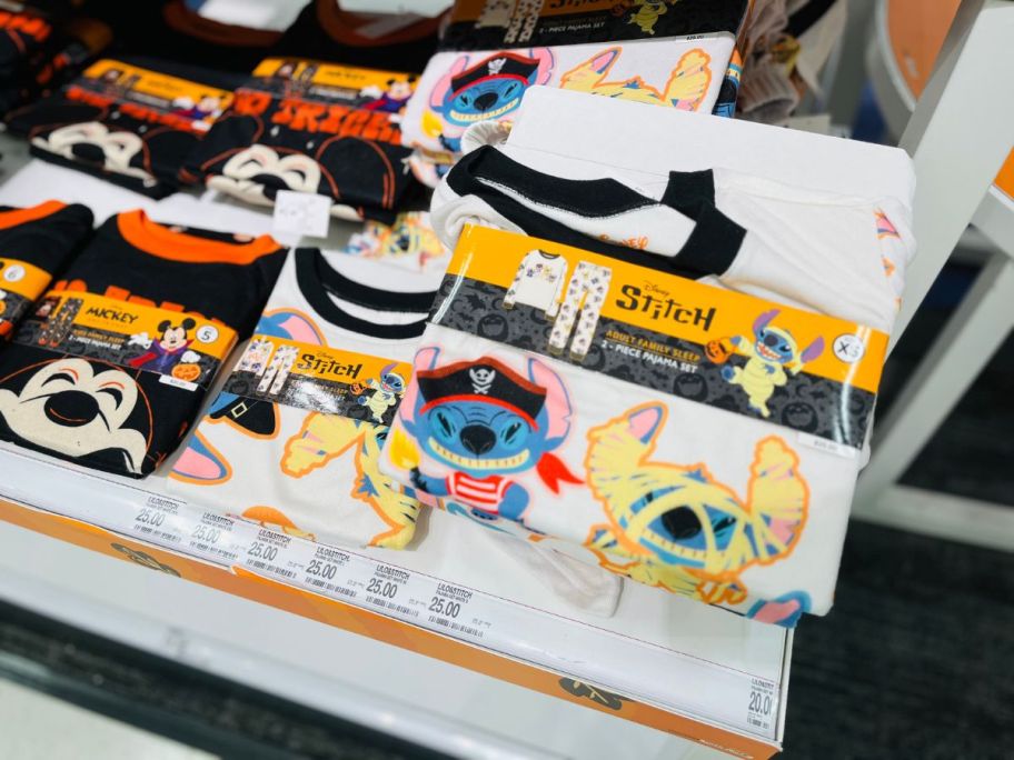 several pajamas with Disney characters on them