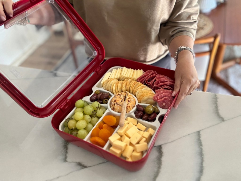 woman showing off Fancy Panz Charcuterie