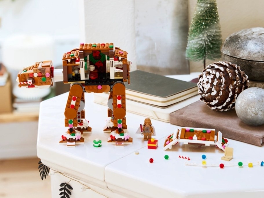 a gingerbread AT AT and gingerbread Darth Vader