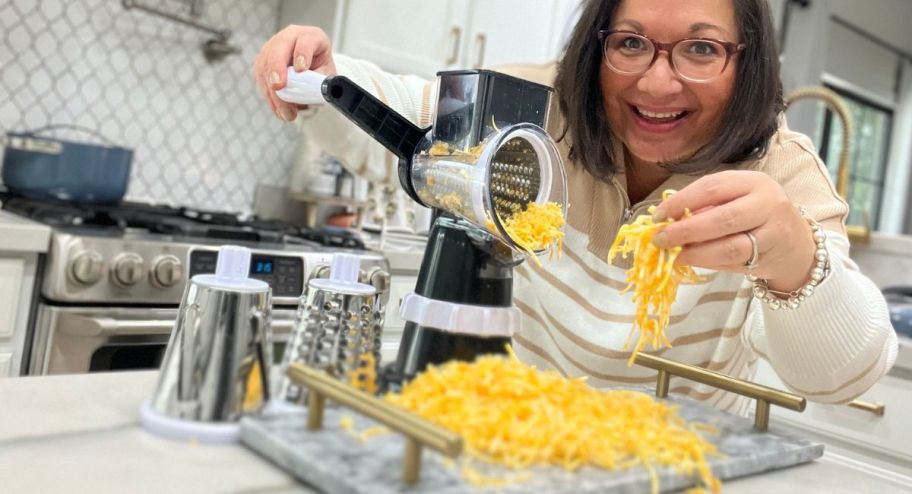 Woman holding grated cheese 
