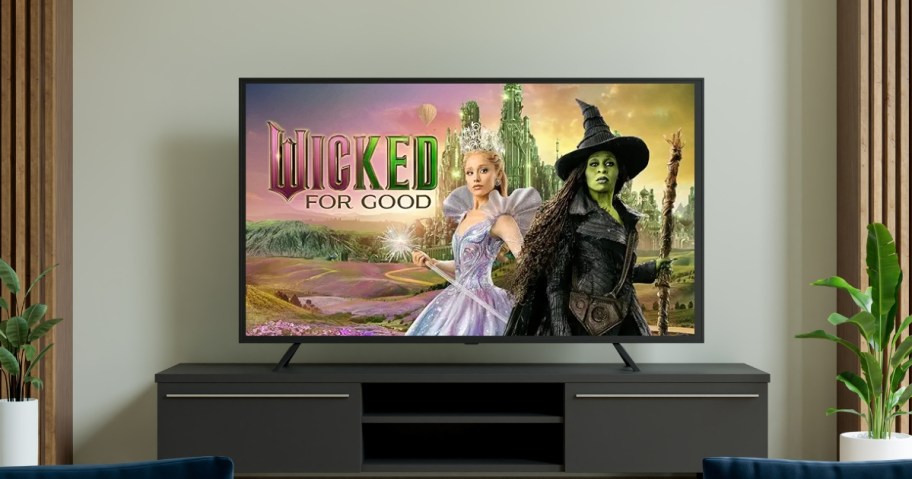 a TV with Wicked for Good movie on it