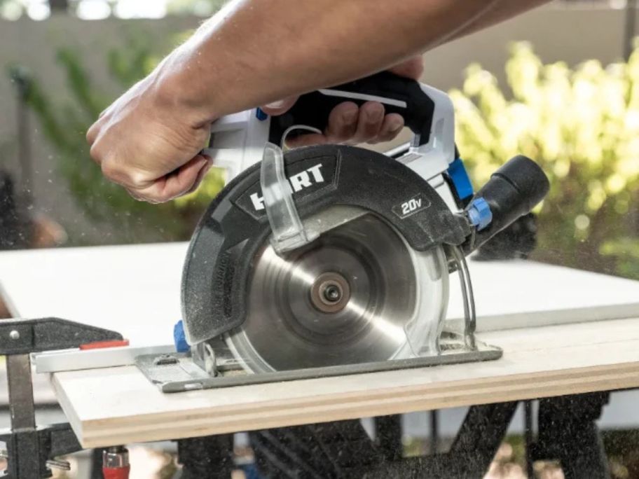 person using hart 20V 6-1/2" circular saw