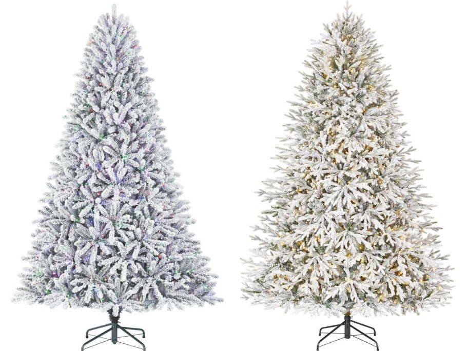 two pre-lit flocked christmas trees