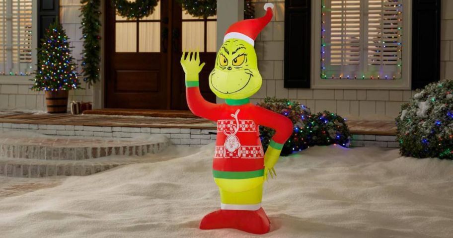 grinch in christmas sweater inflatable