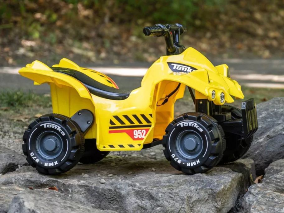 Huffy 6V Tonka Quad Ride-On ATV on rocky surface