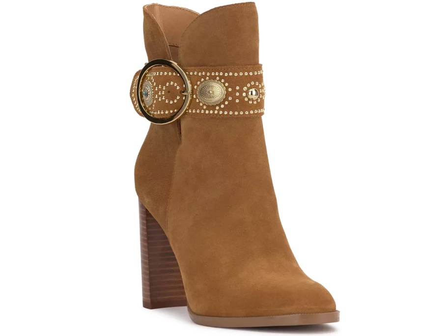 tan heeled bootie with gold strap around ankle