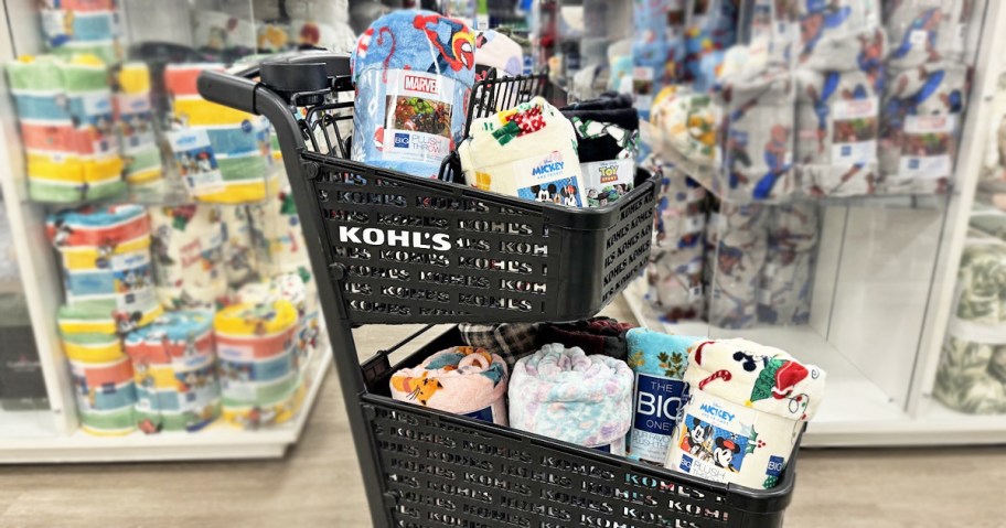 multiple big one blankets inside a black kohls shopping cart