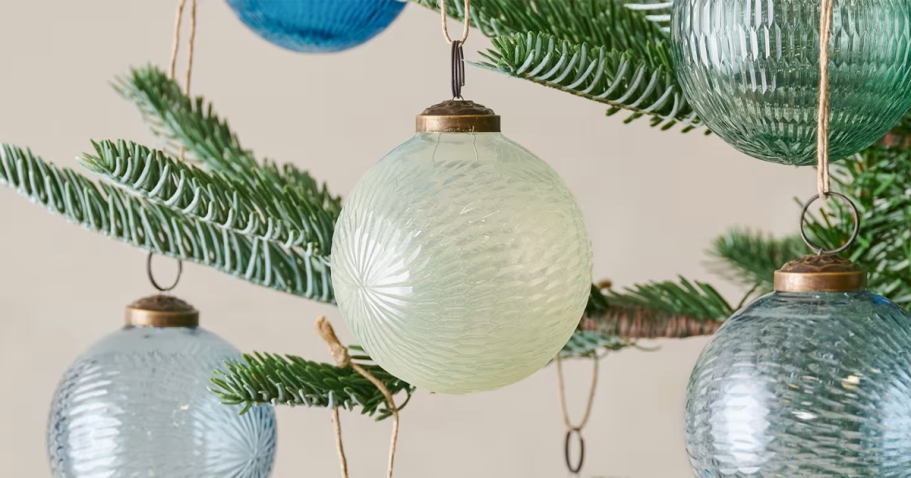 Up to 75% Off Magnolia Christmas Decor | Save on Ornaments, Wrapping Paper, & More