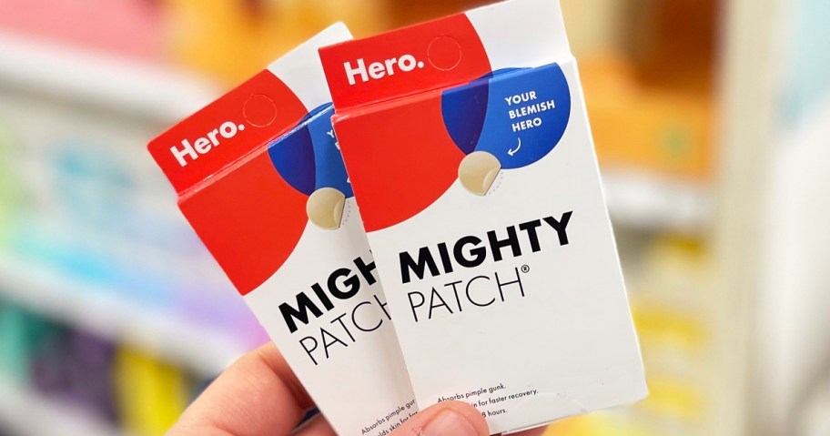 hand holding up two boxes of Mighty Patch in store