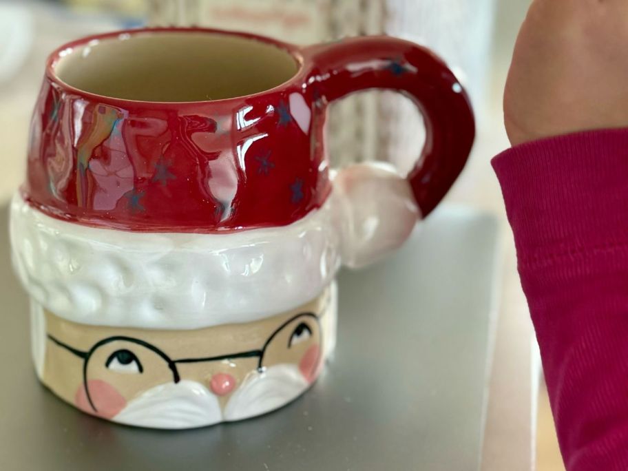 a santa clause mug on a kitchen counter