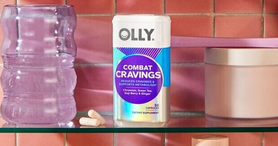 Olly OLLY Combat Cravings, Metabolism & Energy Support Supplement 30-count on.a bathroom cabinet shelf