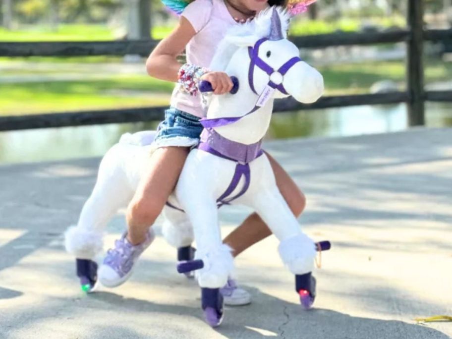 girl riding Power Pony Push Riding Toy - Crystal