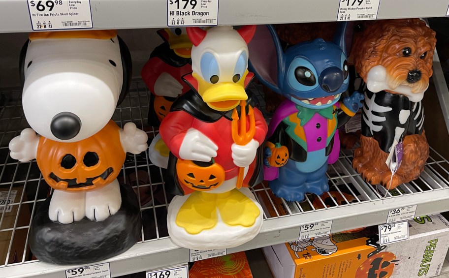 Skeleton Doodle, Snoopy, Donald Duck, Disney Stitch Blow Molds on display at Lowe's