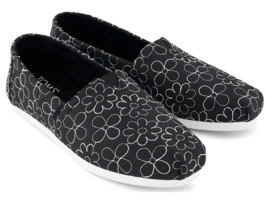 A pair of black canvas shoes 