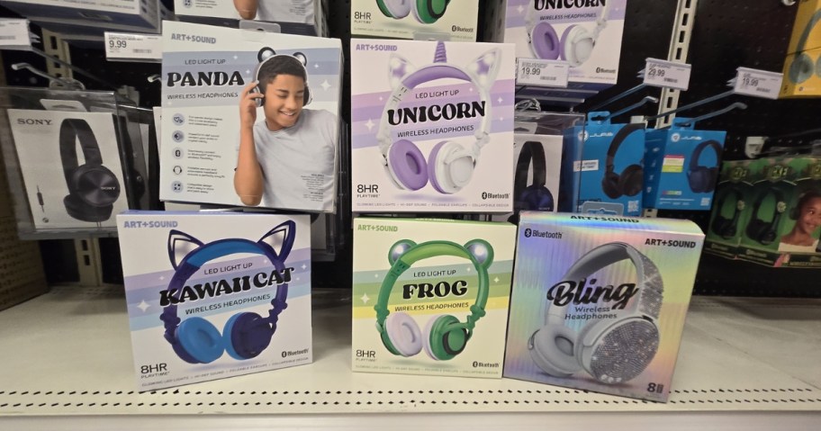 over the ear kids headphones in boxes at store