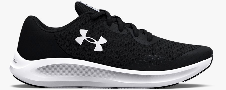 black and white under armour running shoe