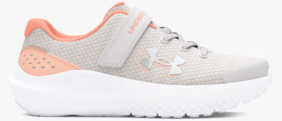 light grey and orange running shoe with velcro closure