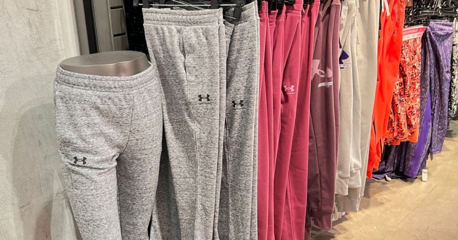 A rack of under armour sweatpants