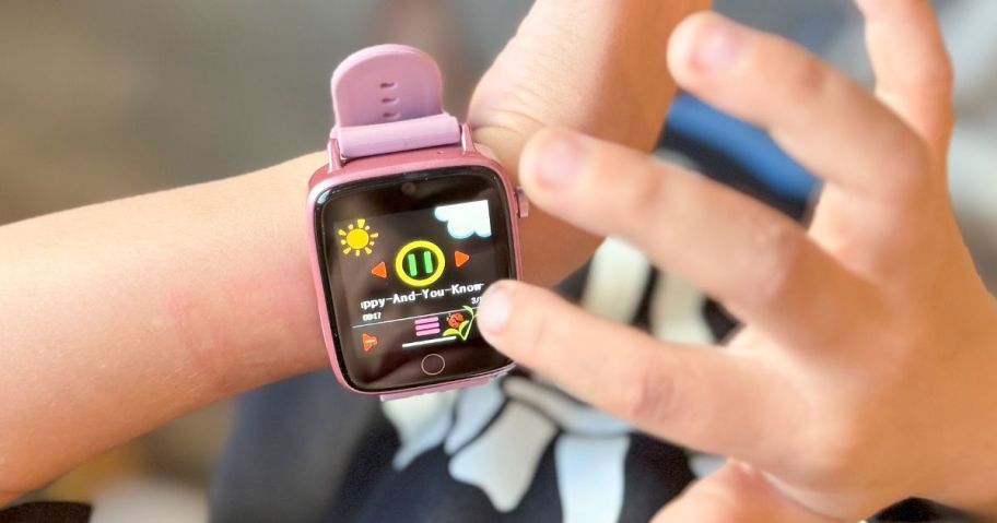 A child wearing a ZUODUN Kids Smartwatch