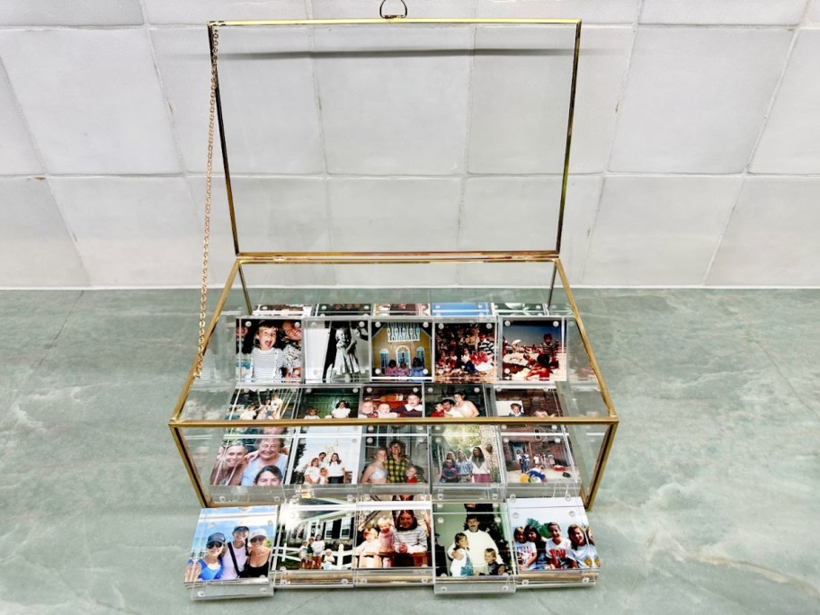 acrylic photo blocks in a glass and gold rimmed container