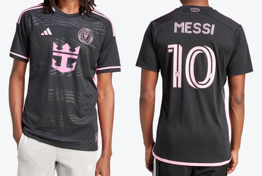 two men in black and pink soccer jerseys