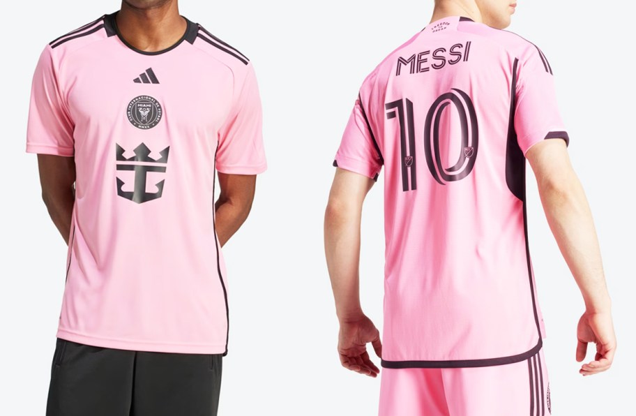 two men in pink and black soccer jerseys