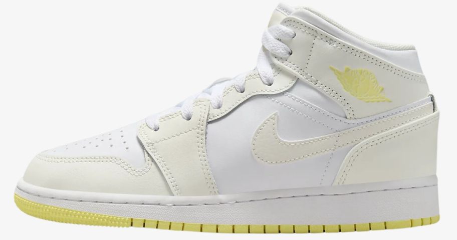 a yellow and white mid top sneaker