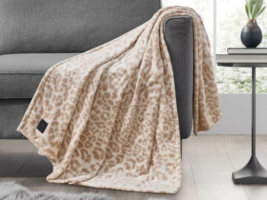 brookstone heated throw on couch