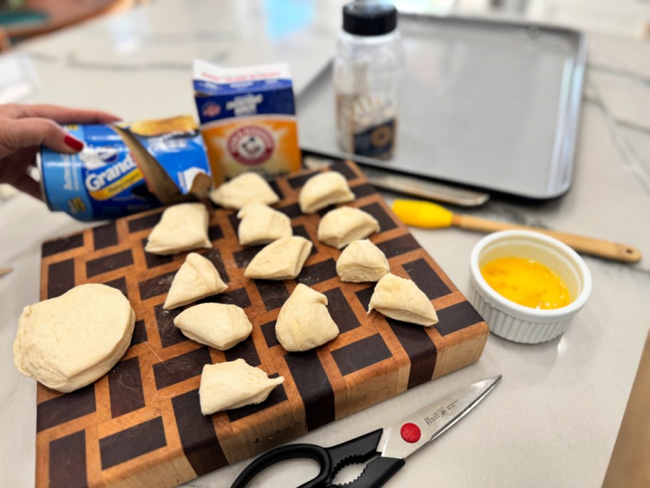 cutting grands biscuit dough to make pretzel bites