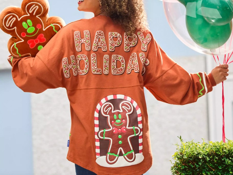 Adult wearing gingerbread spirit jersey