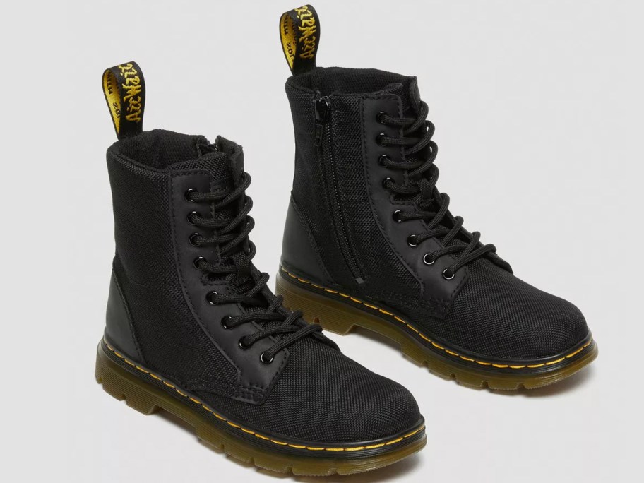 pair of black dr marten boots